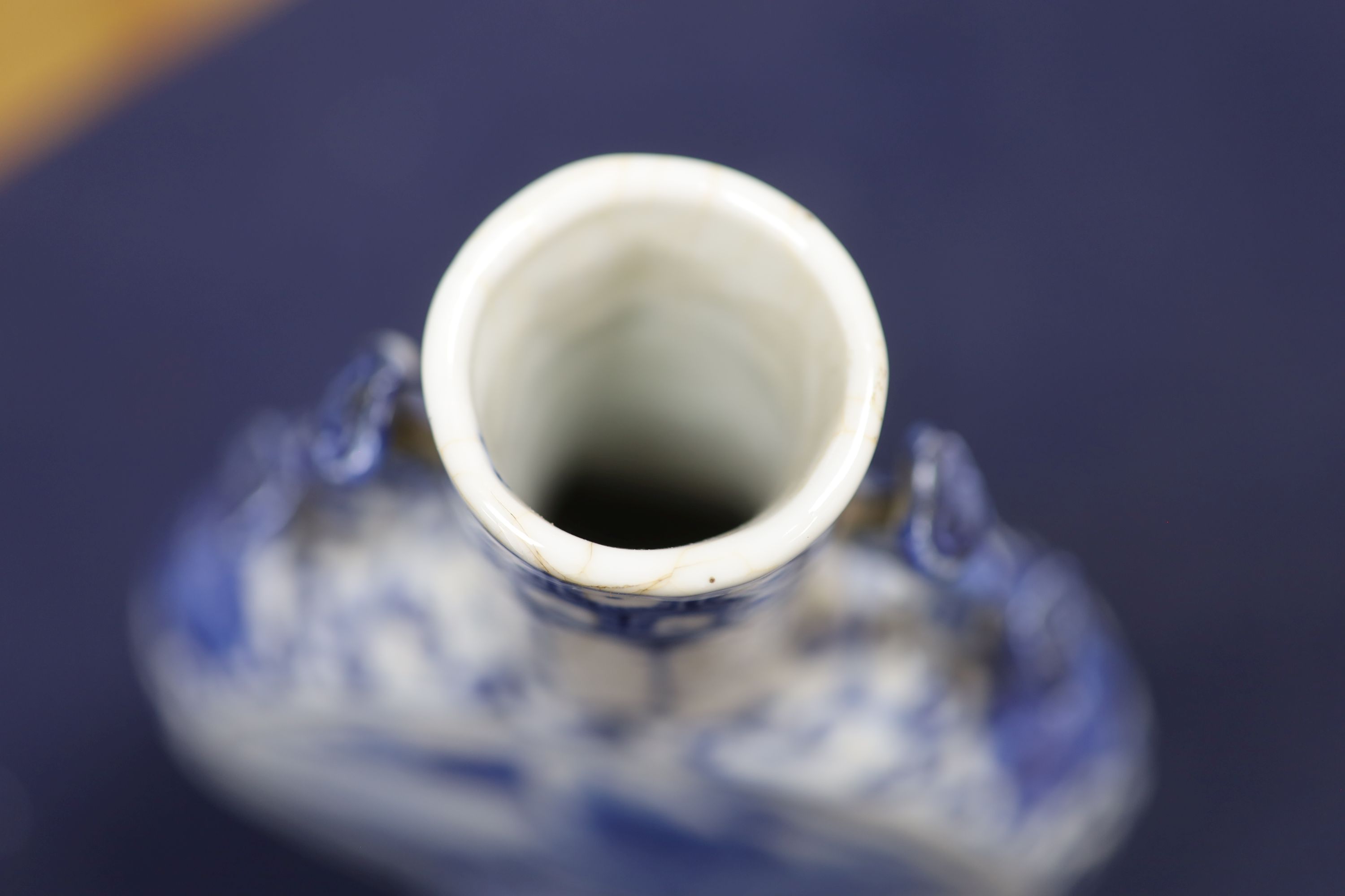 Two 19th century Chinese blue and white moon flasks and a teapot, tallest 21cm